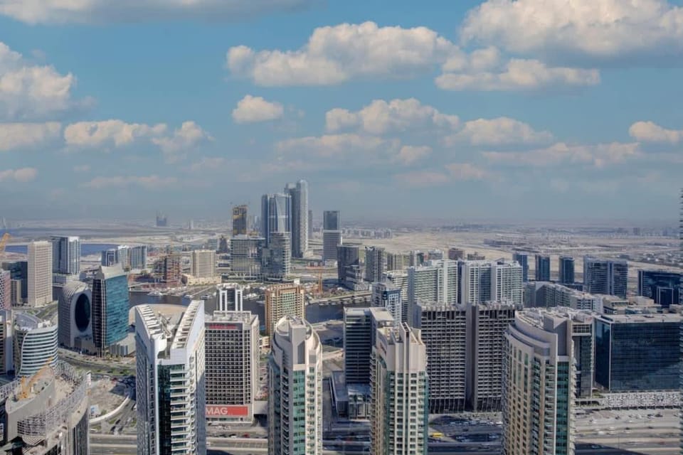 Rentico l Luxury 1BR Downtown Canal & Skyline View Apartment in Dubai
