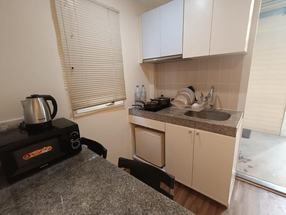 Kitchen or kitchenette, stove