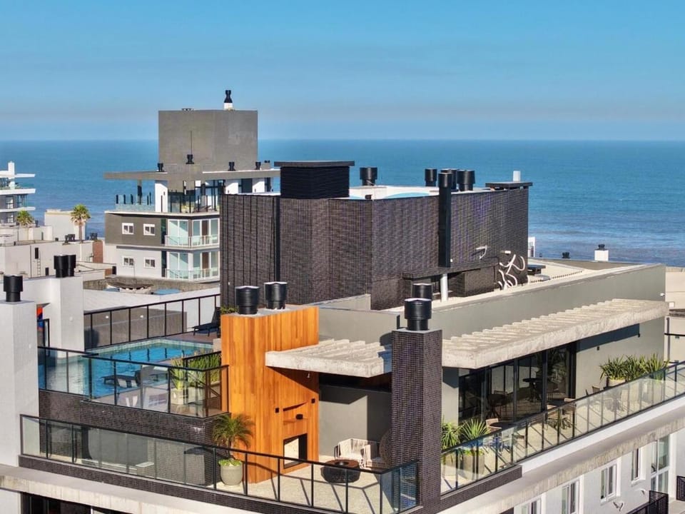 Apto novo 2dorm, 250m mar, infra com piscina Apartment in State of Rio Grande do Sul