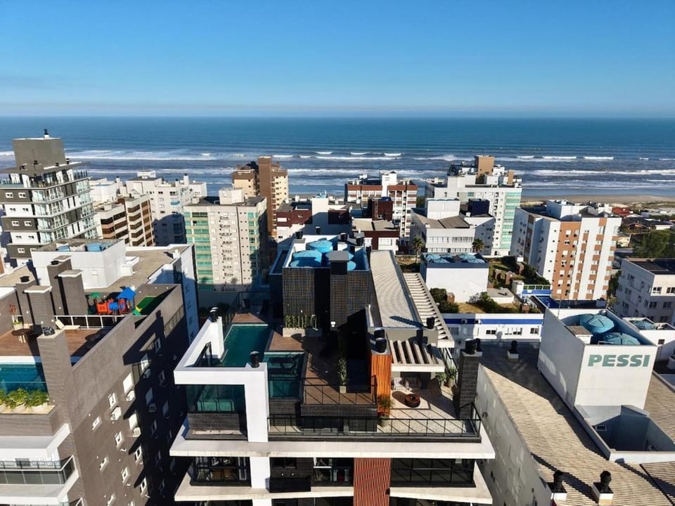 Apto novo 2dorm, 250m mar, infra com piscina Apartment in State of Rio Grande do Sul