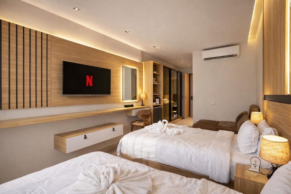 Communal lounge/ TV room, Bed, Photo of the whole room, Seating area, Bedroom, air conditioner