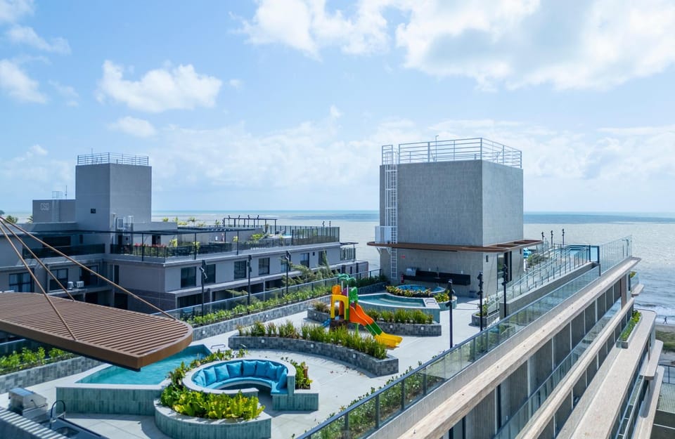 Property building, Day, Natural landscape, Children play ground, Pool view, Sea view, Swimming pool