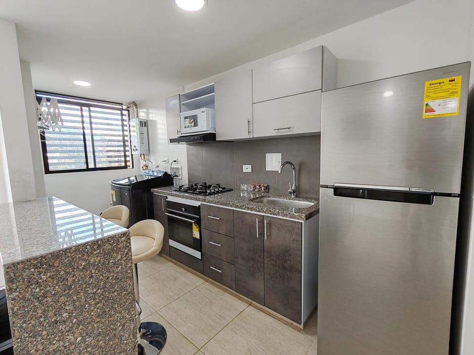 Kitchen or kitchenette, oven, washing machine, kitchen