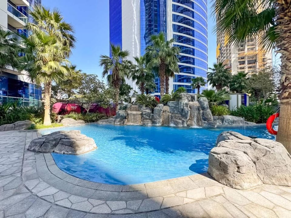 Property building, Day, Pool view, Swimming pool, sunbed