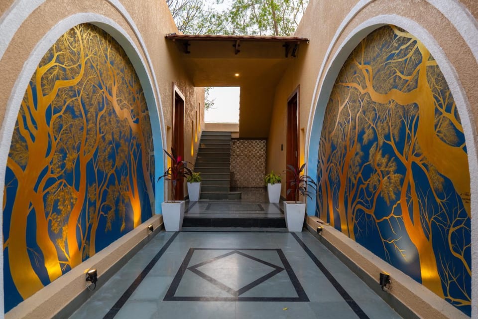 ELIVAAS Signature Tiger Cave Suite with Pvt and Shared Pool On Main Ranthambore Rd Apartment in Rajasthan