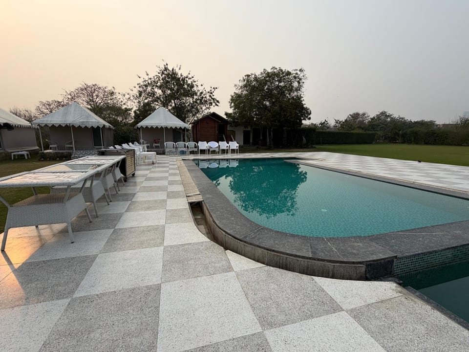 Tvam wisteria sports club Farm Stay in New Delhi
