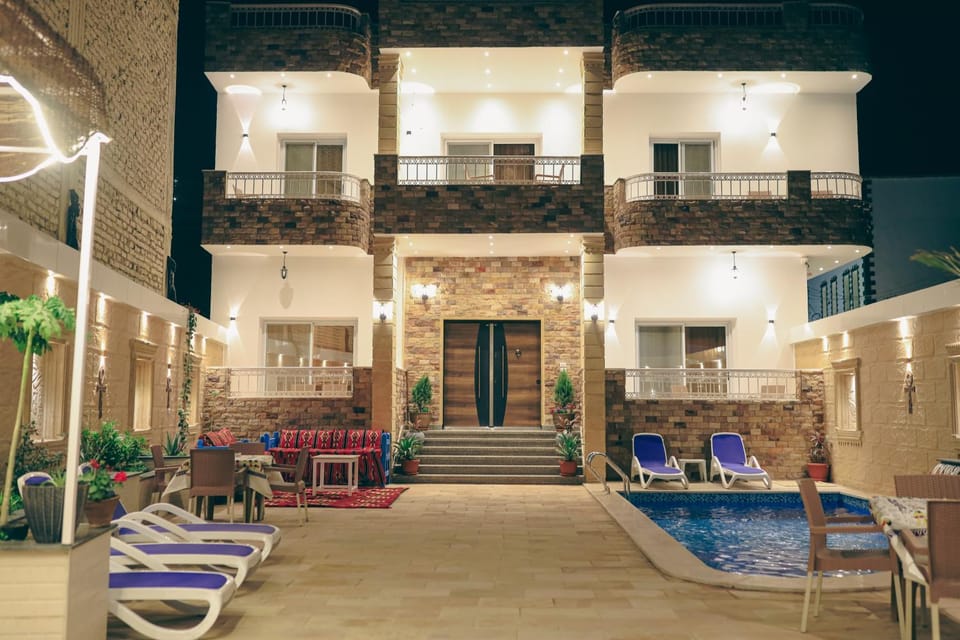 Night, Balcony/Terrace, Seating area, Pool view