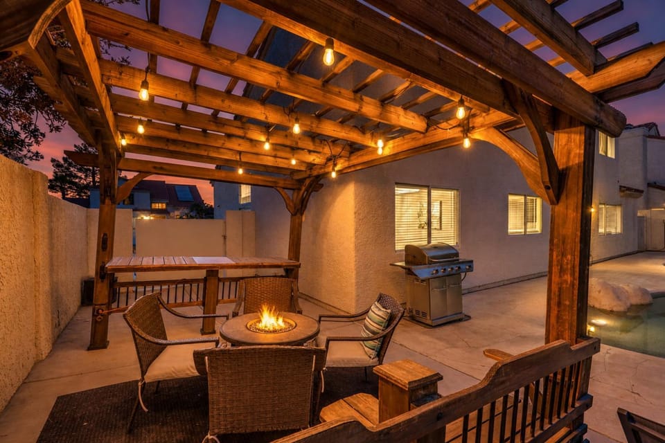 Patio, Night, BBQ facilities, Seating area, Swimming pool, fireplace