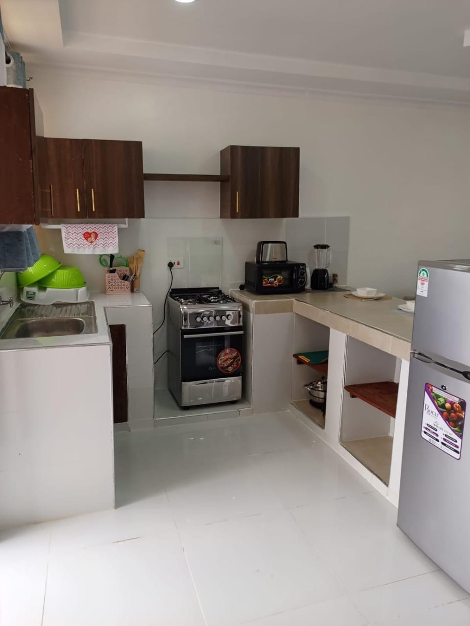 Kitchen or kitchenette, oven, toaster