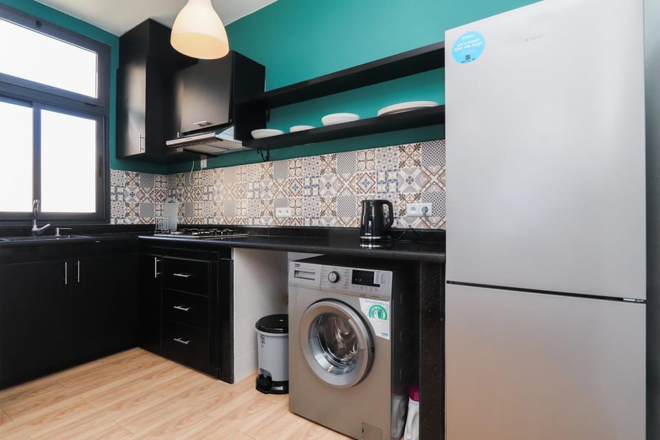 Kitchen or kitchenette, washing machine
