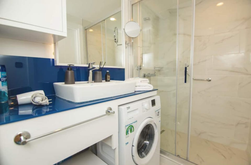 Shower, Bathroom, towels, washing machine, dryer