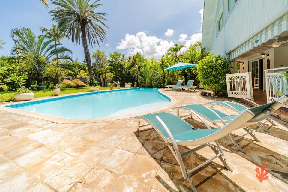 Paradis des Letchis Villa d Exception 12 Pers Piscine XXL Jardin Tropical Plage à 2 min à Pied Villa in Saint-Paul