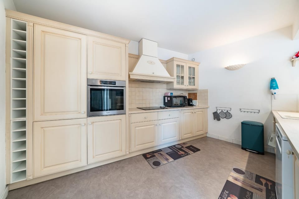Kitchen or kitchenette, dishwasher, oven, stove, toaster