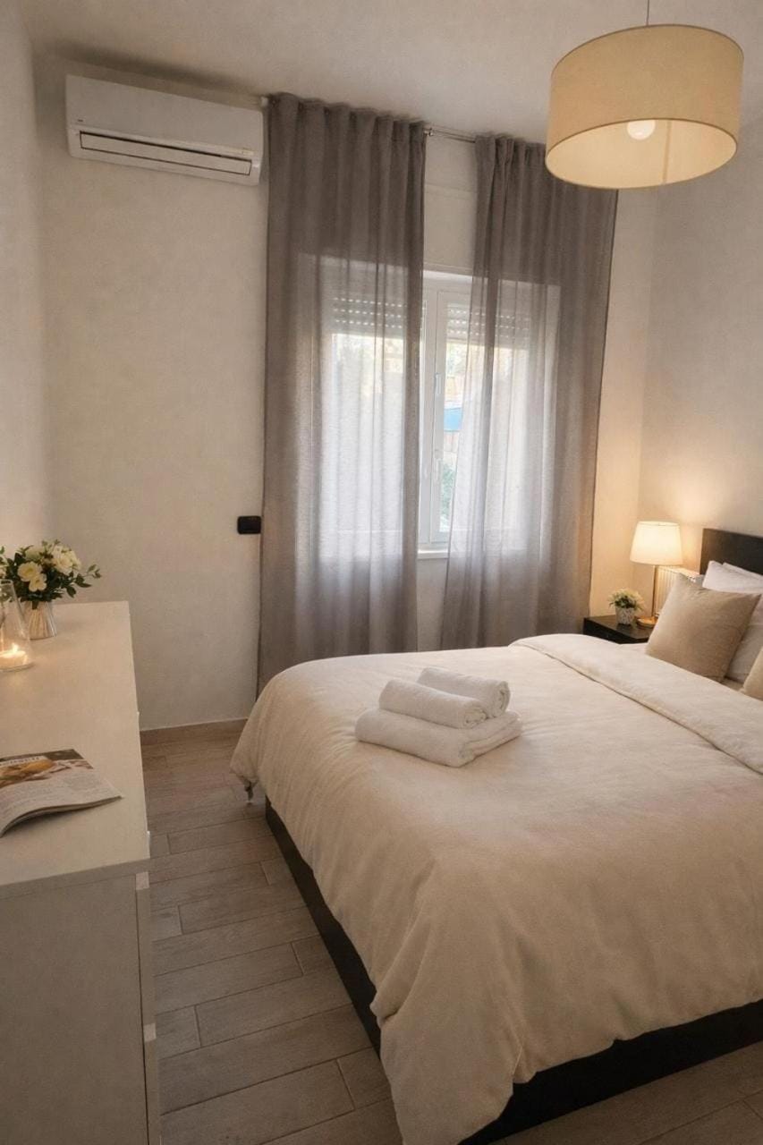 Bed, Photo of the whole room, Bedroom, towels, air conditioner
