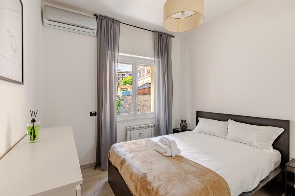 Bed, Photo of the whole room, Bedroom, towels, air conditioner