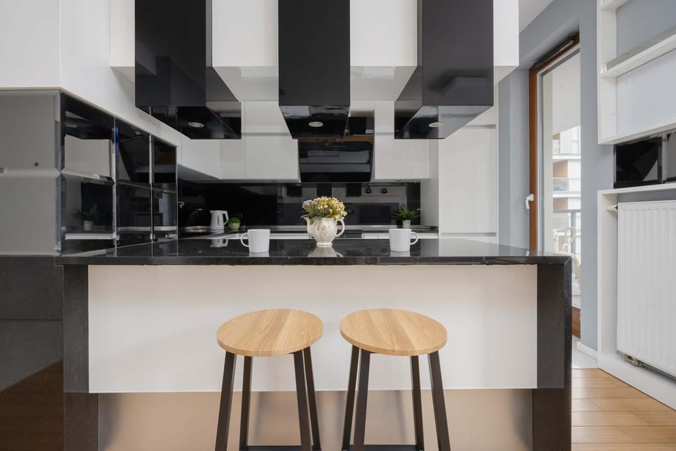 Kitchen or kitchenette, dishwasher, oven, stove