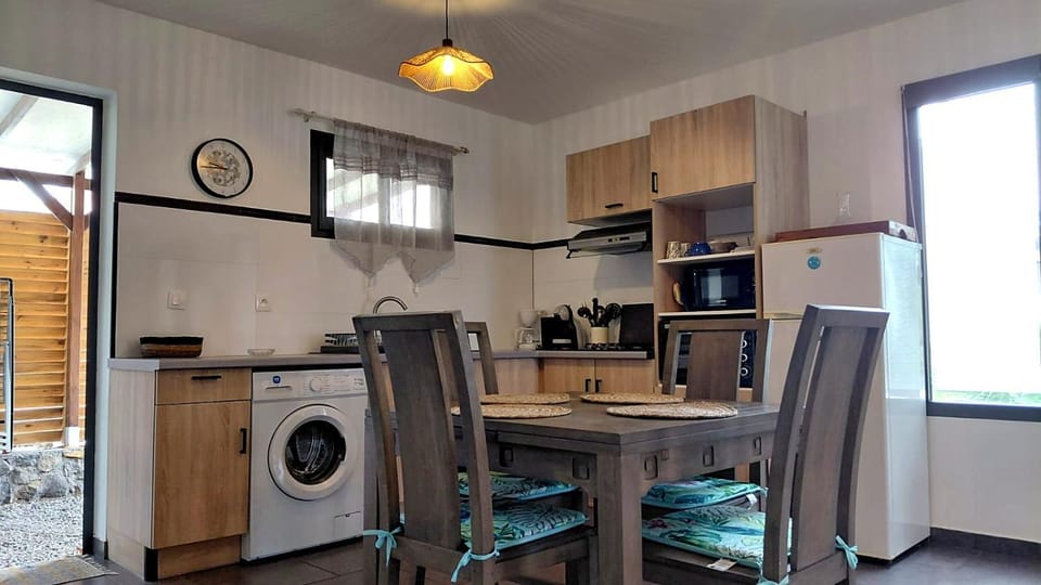 Kitchen or kitchenette, Living room, Dining area, oven, stove, toaster, washing machine