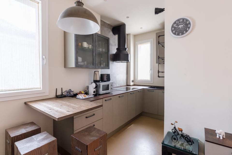 dishwasher, hair dryier, stove, towels, towels, laundry, washing machine, dryer, kitchen