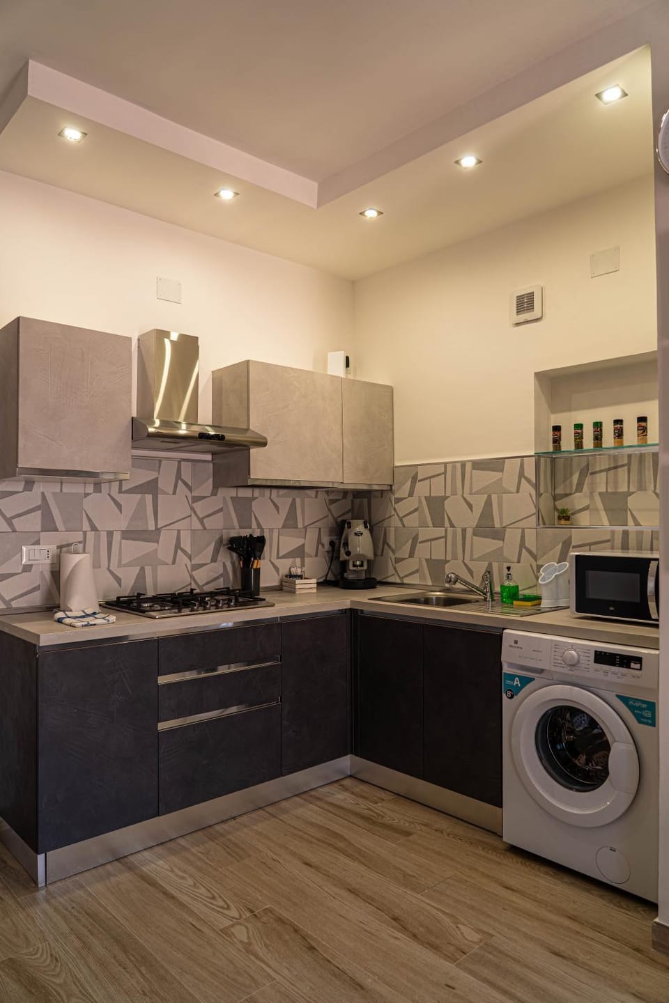 Kitchen or kitchenette, stove, washing machine