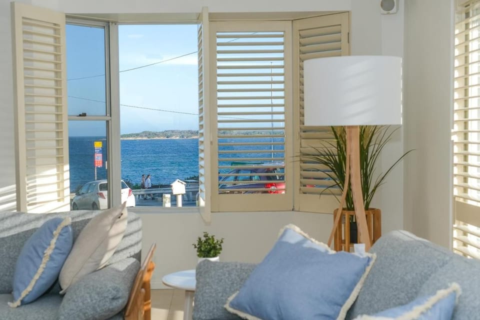 Natural landscape, View (from property/room), Living room, Seating area, Sea view