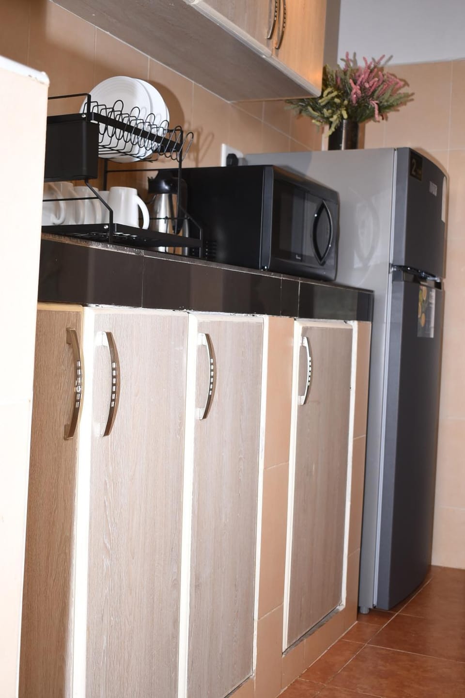 Kitchen or kitchenette, microwave