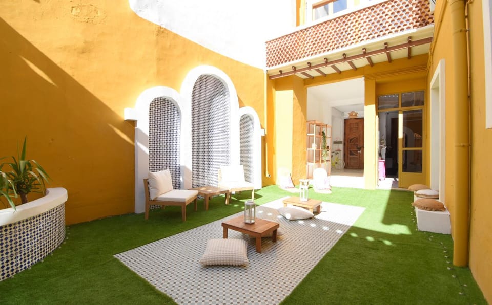 Property building, Patio, Day, Garden, View (from property/room), Seating area