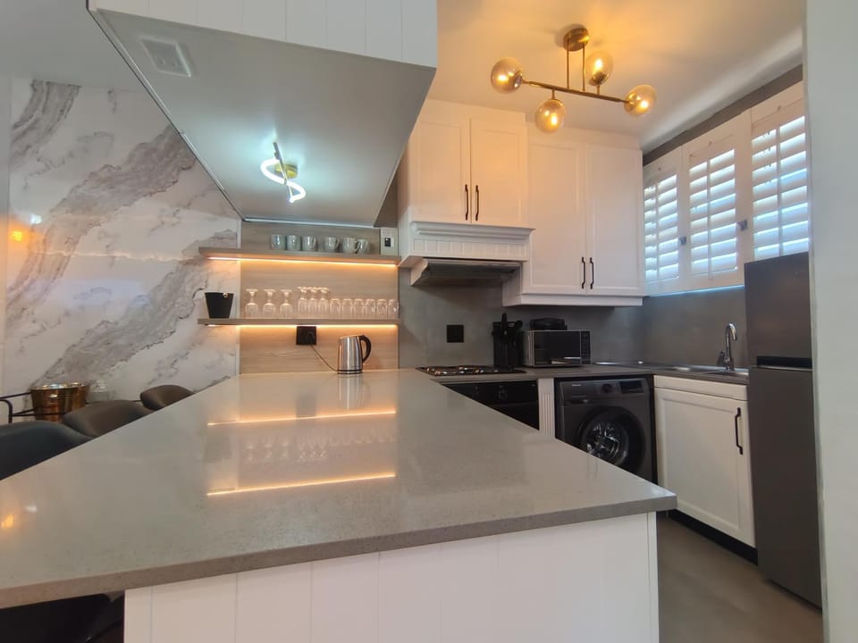 Kitchen or kitchenette, oven, stove
