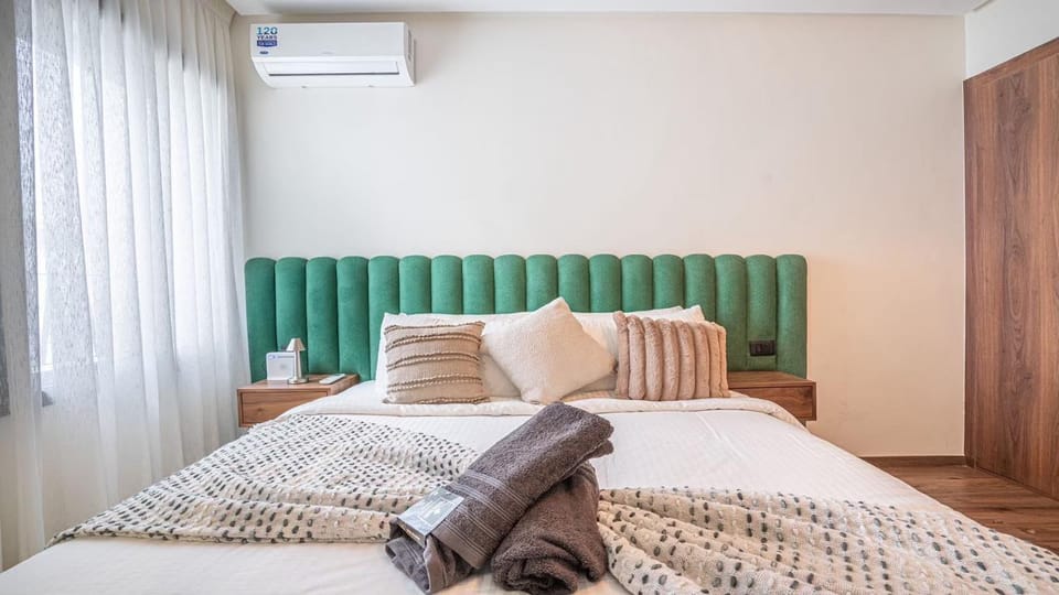 Bed, Photo of the whole room, Bedroom, towels, air conditioner