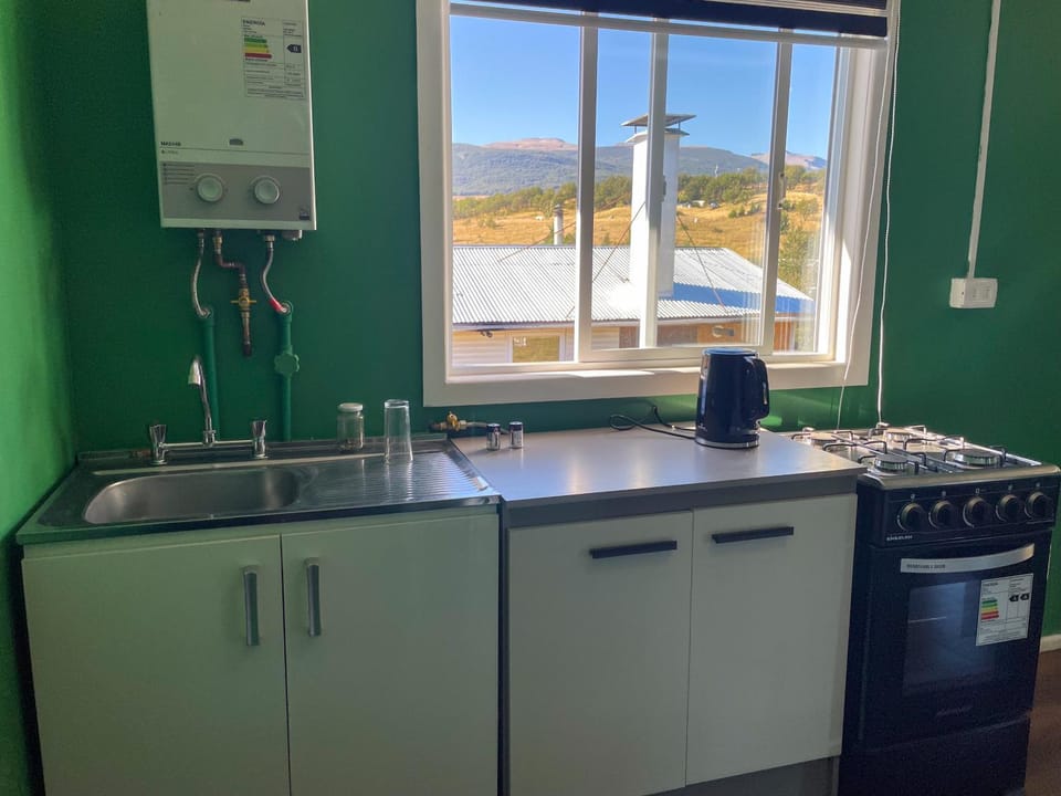 Kitchen or kitchenette, oven, stove