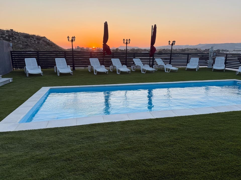 Property building, Living room, Swimming pool