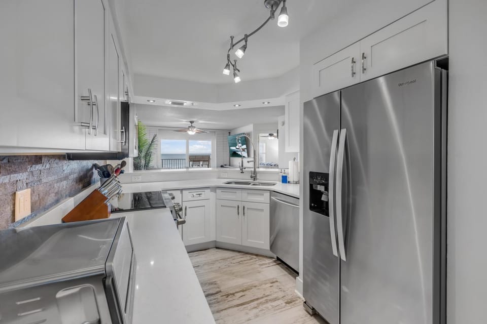 NEW listing! Direct Oceanfront 2-2 - Fully Updated - Heated Pool & Garage Parking Apartment in Ormond By The Sea