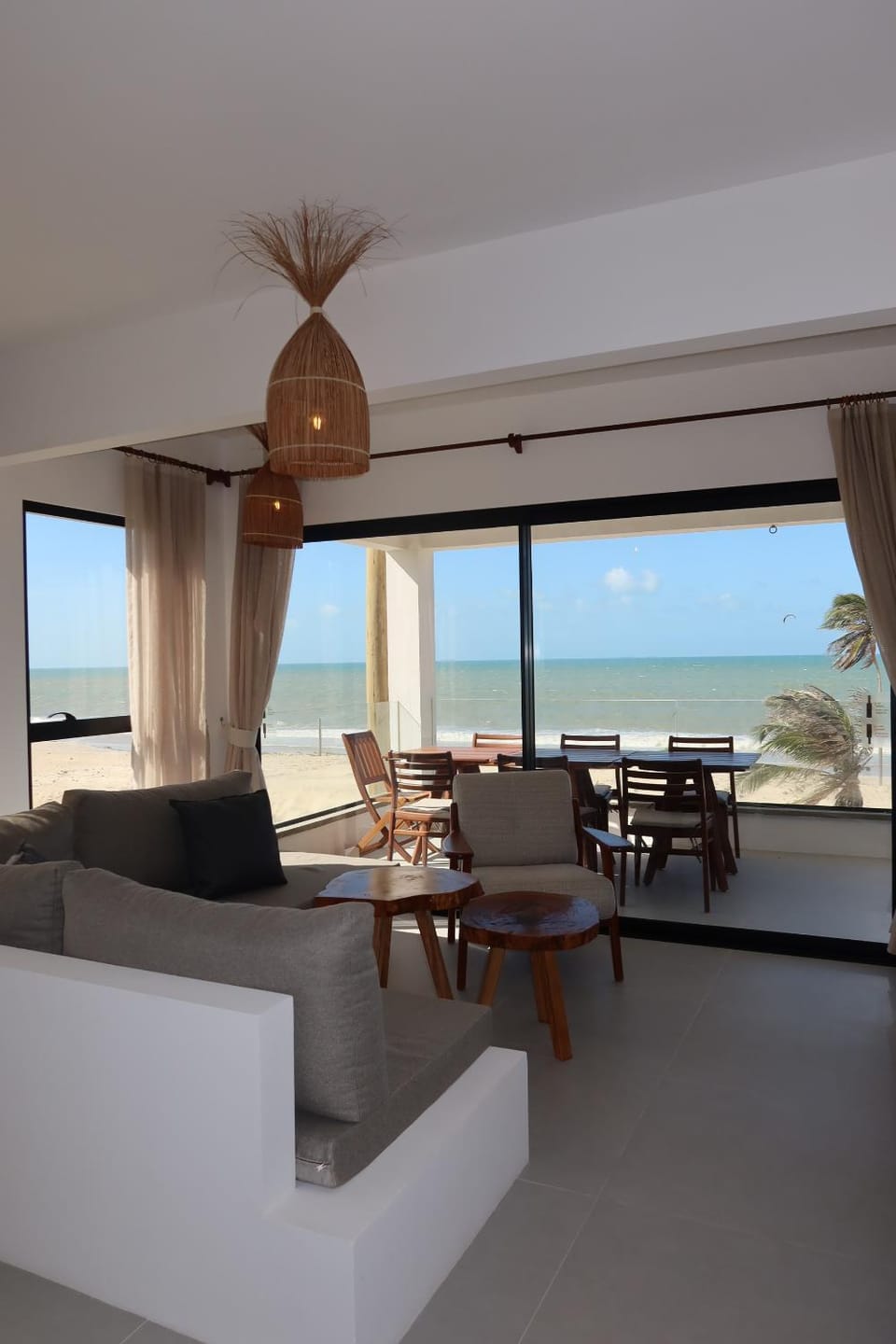 Day, View (from property/room), Balcony/Terrace, Living room, Seating area, Dining area, Beach, Sea view