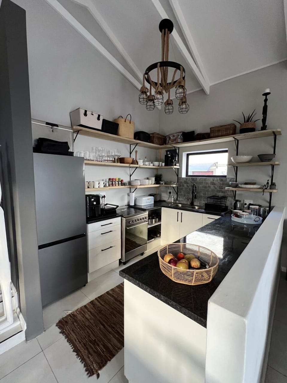 Kitchen or kitchenette, dishwasher, oven, stove