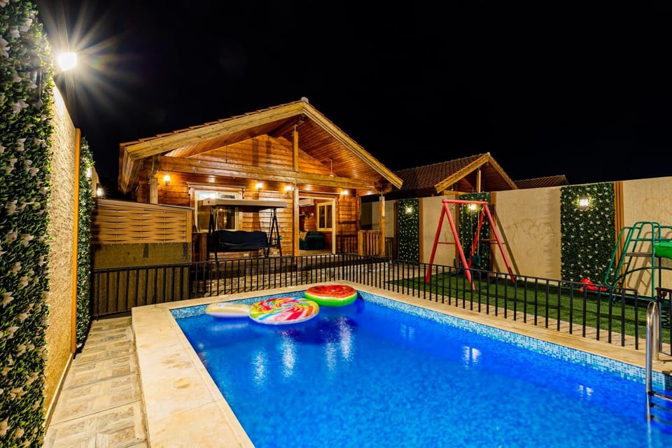 Property building, Night, Pool view, Swimming pool