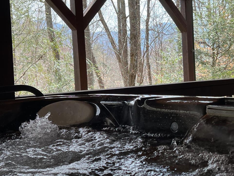 Discover tranquility at Hidden Oasis, a charming home nestled in serene Cherry Log Mountain House in Georgia