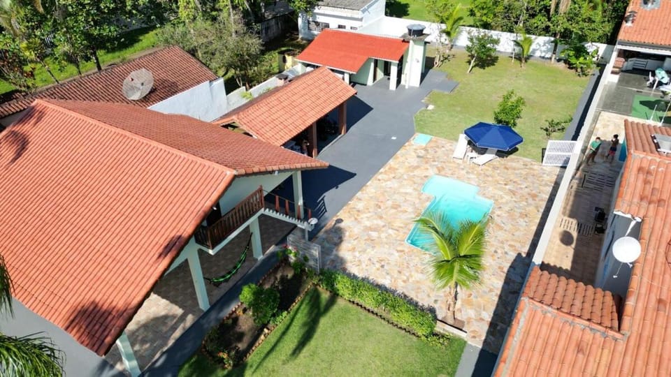 Cantinho do Guaraú Casa aconchegante com piscina House in Peruíbe