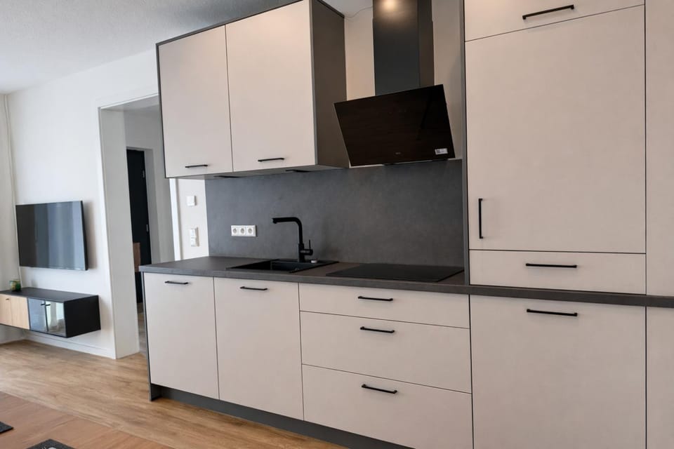 Kitchen or kitchenette, dishwasher, stove, washing machine, kitchen