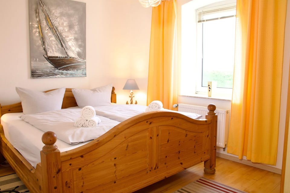 Dat Kapitänshus - Deichläufer Apartment in Nordstrand