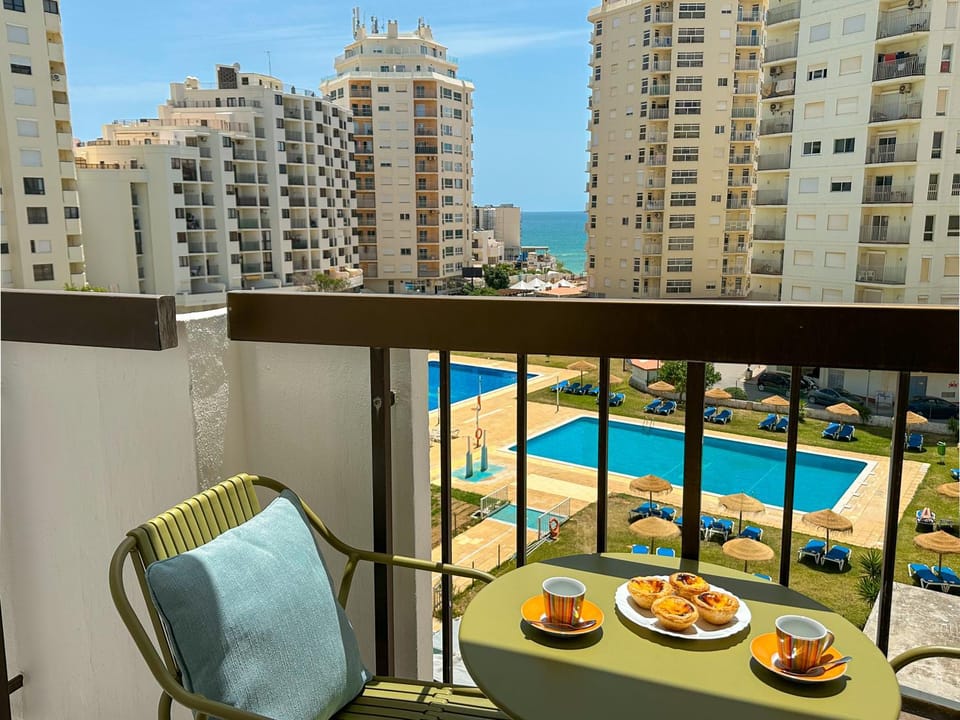 Patio, Living room, Seating area, Dining area, Pool view, Swimming pool