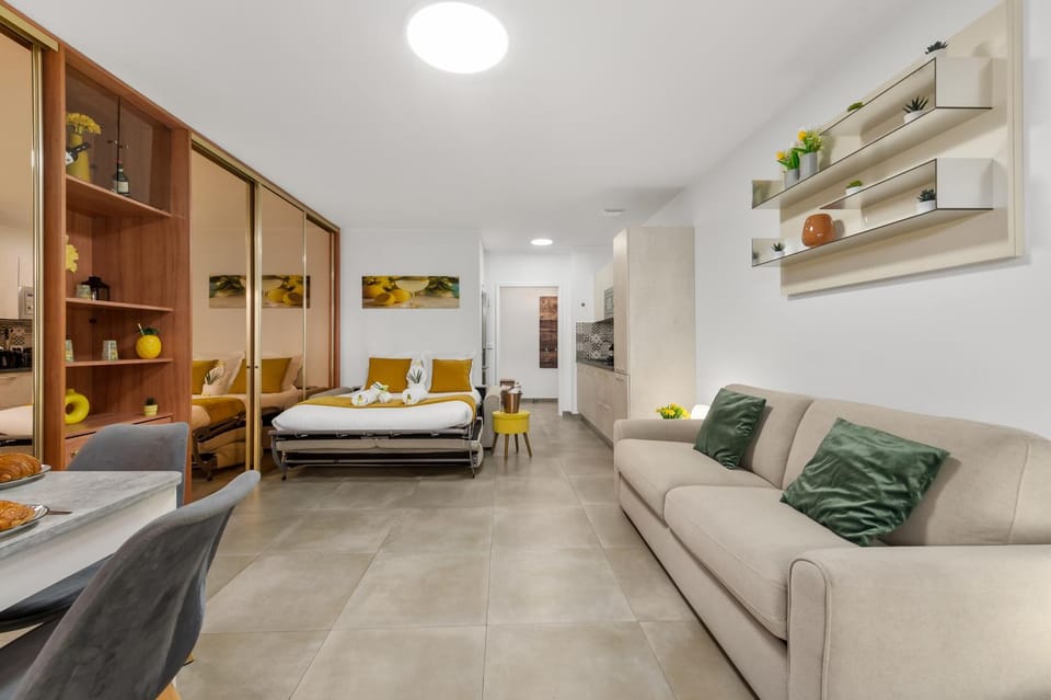 Bed, Living room, Seating area, Dining area