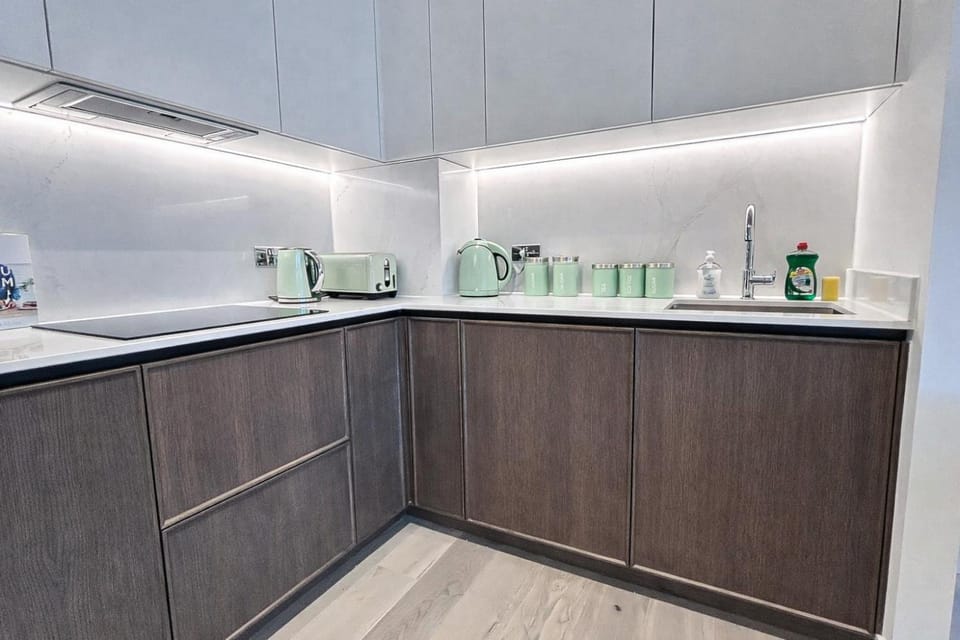 Coffee/tea facilities, Kitchen or kitchenette, dishwasher, heating, microwave, oven, storage, stove, toaster, washing machine, dryer, air conditioner