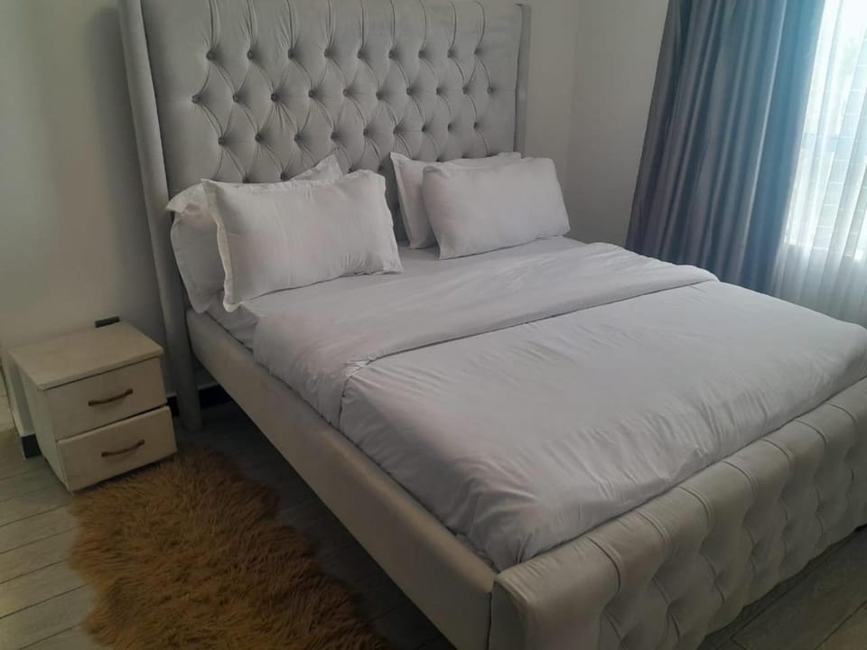 modern serenity suites apartments with swimming pool,modern equipped gym,private parking space, children playing ground, proximity to major shopping malls and unbeatable city views Apartment in Nairobi