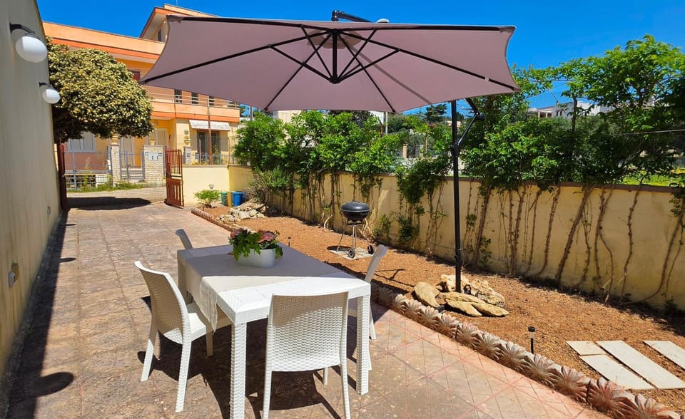 Property building, Dining area, Garden view