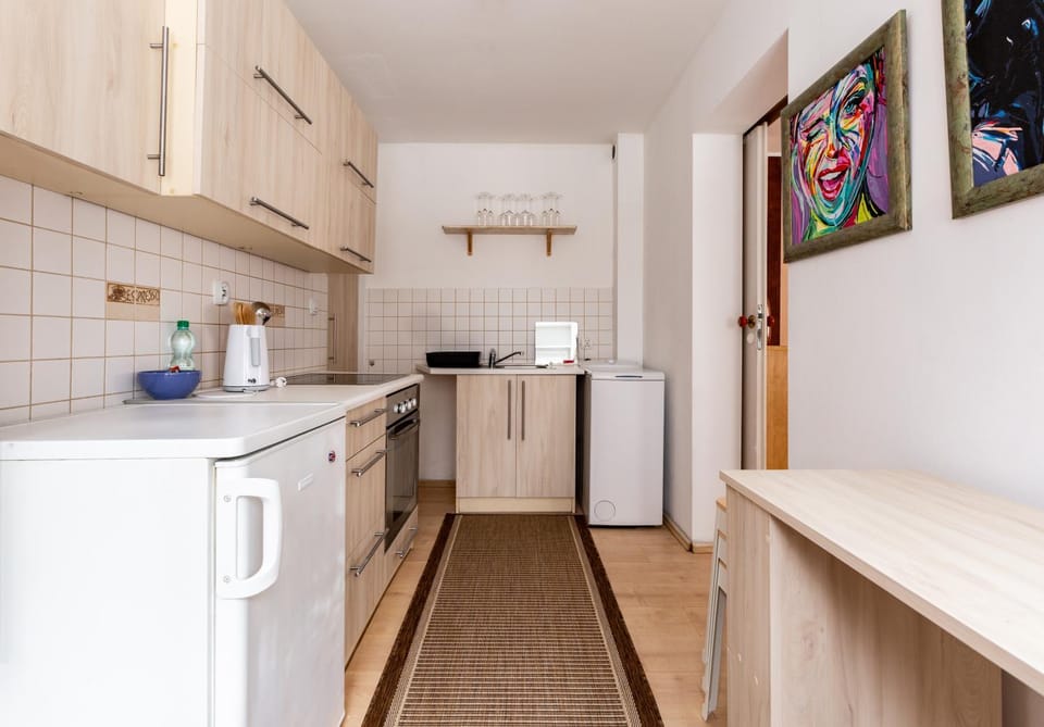 Kitchen or kitchenette, oven, stove