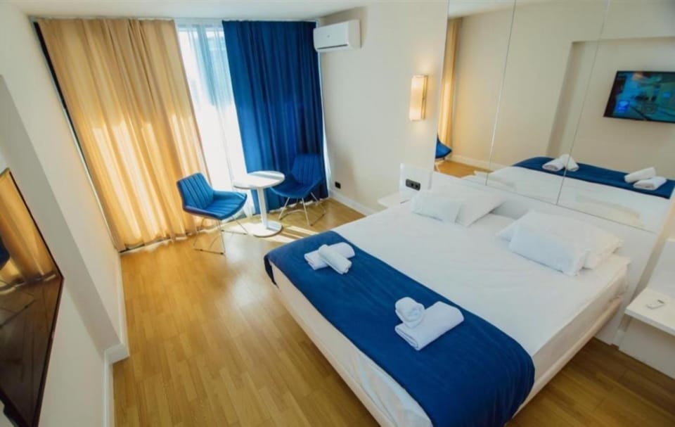 Bed, TV and multimedia, towels, air conditioner