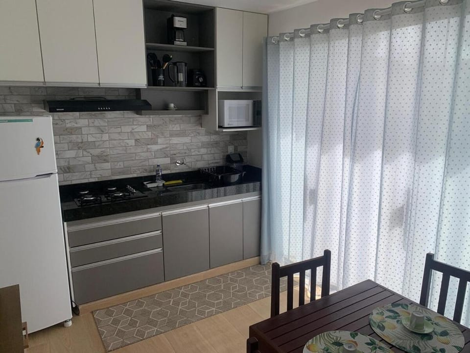 Kitchen or kitchenette, oven, stove