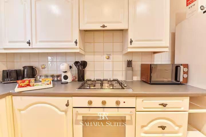 Kitchen or kitchenette, stove, toaster