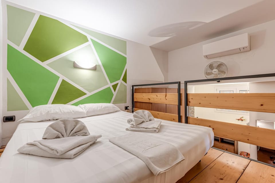 Bed, Photo of the whole room, Bedroom, bunk bed, towels, air conditioner