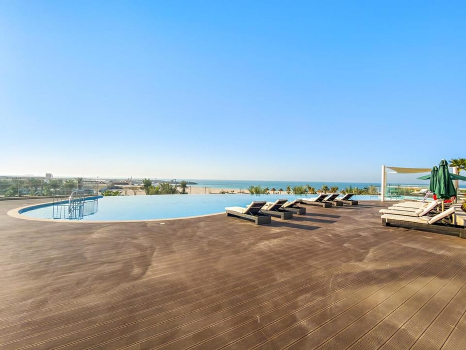 FIRST CLASS 1BR Beachfront Bliss Escape Apartment in Ras al Khaimah