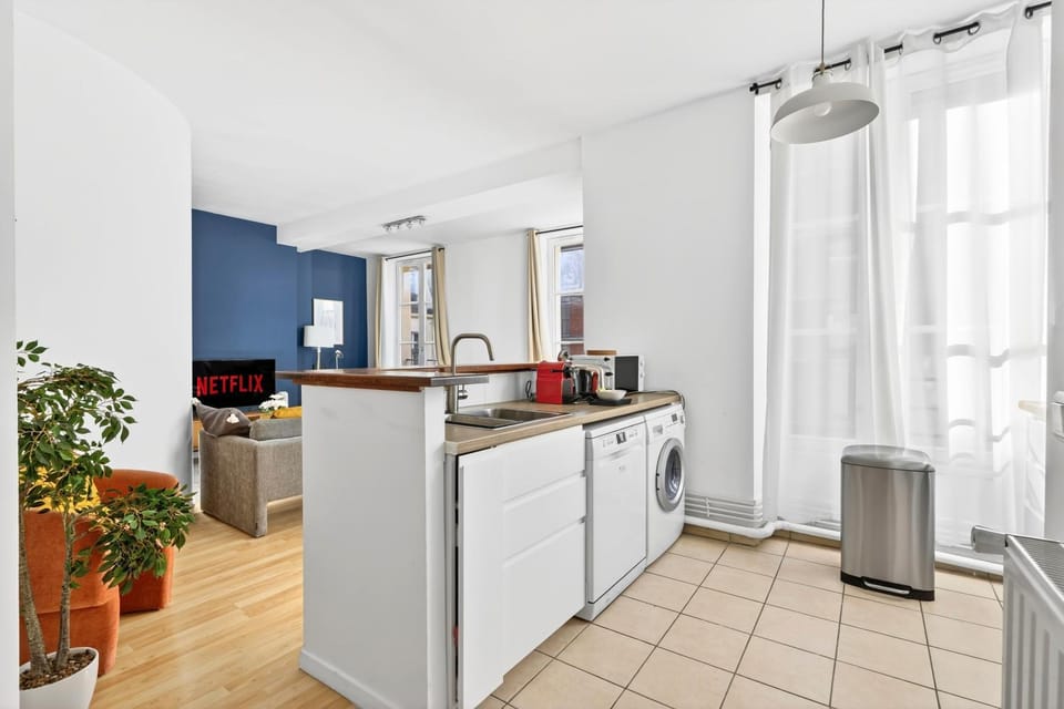 Kitchen or kitchenette, dishwasher, stove, toaster